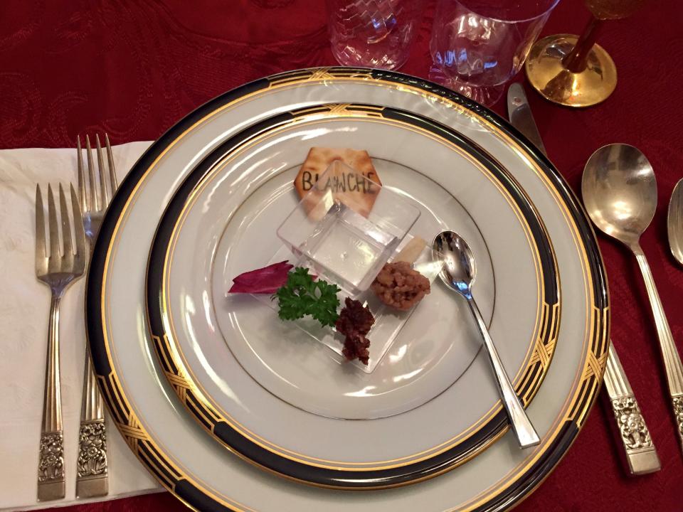 A Seder supper includes eating symbolic foods. This is a Seder plate from the Fenster family.