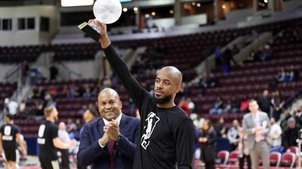 Lorenzo Brown accepts his G League MVP award. Brown averaged 18.8 points and 8.9 assists during the 2017-18 season, leading the 905 to a second straight finals appearance. Yahoo Sports confirmed after the game that the Toronto Raptors plan to sign Brown for the remainder of the NBA season.