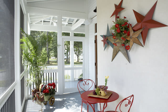 <p>The front covered porch leads to a screened-in porch around the side of the house. Sit out front with a glass of iced tea and wave to neighbors, or retreat to the screened-in side porch for more intimate family dinners. </p>