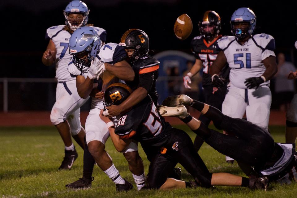 Pennsbury's Ben Primich (bottom) makes a tackle during his sophomore season.