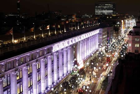 Oxford Street is illuminated after singer Cheryl Fernandez-Versini switched on the Oxford Street Christmas Lights in London November 6, 2014. REUTERS/Luke MacGregor