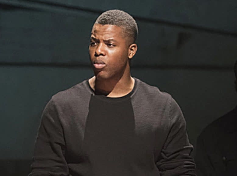 Winston Duke in Person of Interest wearing a crew-neck sweatshirt