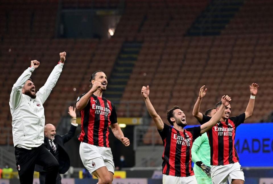 Milan celebrate their derby winAFP via Getty Images