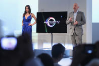 BERLIN, GERMANY - AUGUST 30: Michael Zoeller, European Marketing Director TV/AV at Samsung Electronics, and model Angela Belotte present a new 55" Samsung OLED television to the media during a press day at the IFA 2012 consumer electronics trade fair on August 30, 2012 in Berlin, Germany. IFA 2012 will be open to the public from August 31 through September 5. (Photo by Sean Gallup/Getty Images)