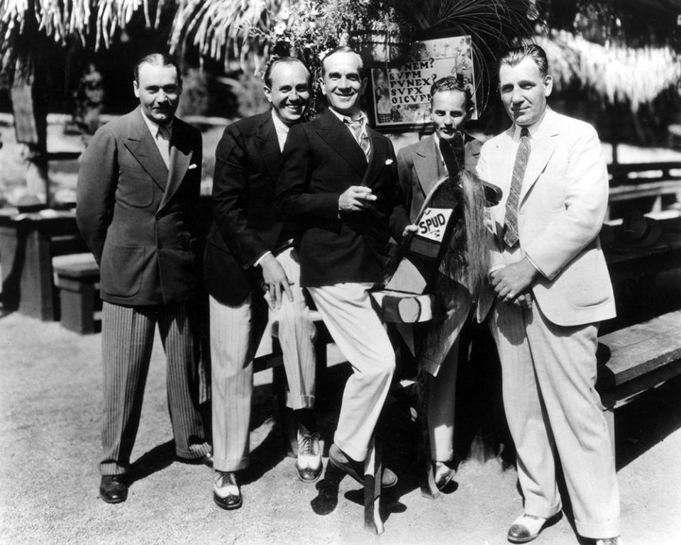 HARRY WARNER, JACK L. WARNER, AL JOLSON, DARRYL F. ZANUCK and AL WARNER kidding on the Warners lot, c. 1927