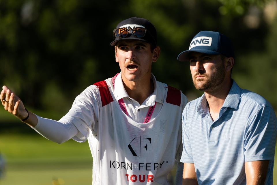 Christopher Petefish and his caddie on the 18th hole during the Utah Championship, part of the PGA Korn Ferry Tour, at Oakridge Country Club in Farmington on Sunday, Aug. 6, 2023. Petefish finished second place with -23. | MEGAN NIELSEN, Megan Nielsen, Deseret News