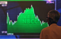 A man looks at a screen displaying news of markets update inside the Bombay Stock Exchange (BSE) building in Mumbai, India, May 23, 2019. REUTERS/Francis Mascarenhas