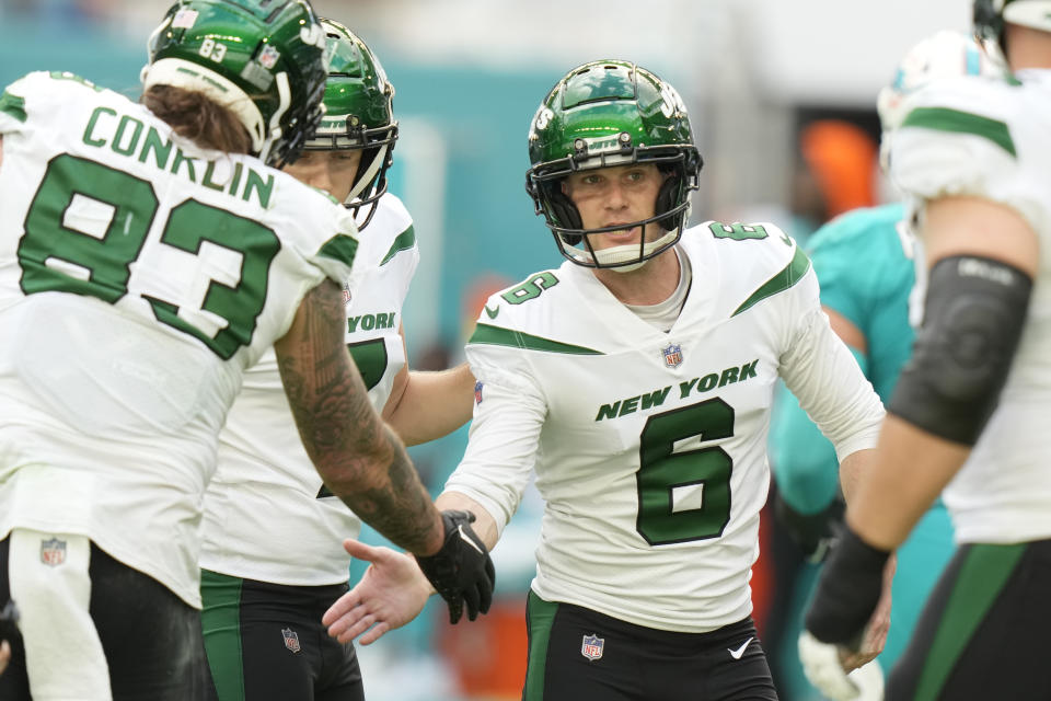 New York Jets place kicker Greg Zuerlein (6) is congratulated after kicking a field goal during the first half of an NFL football game against the Miami Dolphins, Sunday, Jan. 8, 2023, in Miami Gardens, Fla. (AP Photo/Lynne Sladky)