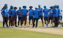 Cricket - Sri Lanka v India - India's Team Practice Session - Galle, Sri Lanka - July 24, 2017 - India's cricket captain Virat Kohli talks to his team next to coach Ravi Shastri ahead of their first test match. REUTERS/Dinuka Liyanawatte