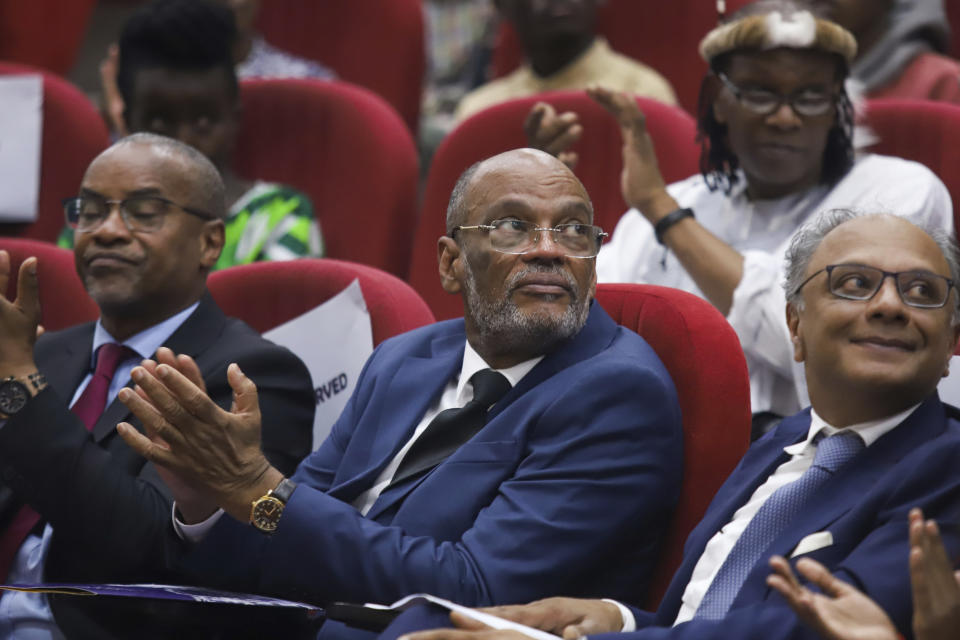 FILE - Haiti's Prime Minister Ariel Henry attends a public lecture at the United States International University in Nairobi, Kenya, March 1, 2024. The prime minister had traveled to Kenya to push for the U.N.-backed deployment of a police force from the East African country to fight gangs in Haiti. Henry, who is facing calls to resign or form a transitional council, remains unable to return home. (AP Photo/Andrew Kasuku, File)