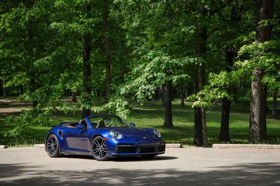 <p>The 2022 Porsche 911 Turbo and Turbo S, which come in familiar, understated coupe and cabriolet body styles, are the pinnacle of the automaker's most revered nameplate. At their heart—albeit located in their tails—is a twin-turbo 3.7-liter flat-six that develops 573 horsepower in the Turbo and 640 in the Turbo S. Along with spine-tingling yawps at stratospheric rpm, the engine delivers neck-snapping acceleration. After all, the 911 Turbo S is <a href="https://www.caranddriver.com/news/a34359564/2021-porsche-911-turbo-s-testing-zero-to-60/" rel="nofollow noopener" target="_blank" data-ylk="slk:among the quickest cars we've ever tested;elm:context_link;itc:0;sec:content-canvas" class="link ">among the quickest cars we've ever tested</a>. Helping achieve that historic status is standard all-wheel drive and an eight-speed dual-clutch automatic that ranks among the best. While we wish there was a manual option, and though we found the sportiest suspension setup to be overly stiff, the 2022 911 Turbo and Turbo S offer a sublime driving experience that even some more exotic supercars can't replicate. This helps them earn a spot on <a href="https://www.caranddriver.com/features/a38873223/2022-editors-choice/" rel="nofollow noopener" target="_blank" data-ylk="slk:our 2022 Editors' Choice list;elm:context_link;itc:0;sec:content-canvas" class="link ">our 2022 Editors' Choice list</a>.</p><p><a class="link " href="https://www.caranddriver.com/porsche/911-turbo-turbo-s" rel="nofollow noopener" target="_blank" data-ylk="slk:Review, Pricing, and Specs;elm:context_link;itc:0;sec:content-canvas">Review, Pricing, and Specs</a></p>