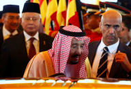 Saudi Arabia's King Salman leaves after inspecting an honour guard with Malaysia's Prime Minister Najib Razak (L) at the Parliament House in Kuala Lumpur, Malaysia February 26, 2017. REUTERS/Edgar Su