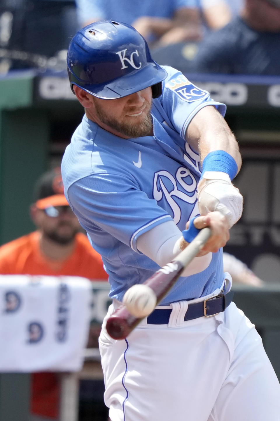 Kansas City Royals Hunter Dozier hits a double during the seventh inning of a baseball game against the Baltimore Orioles at Kauffman Stadium in Kansas City, Mo., Sunday, July 18 2021. (AP Photo/Orlin Wagner)