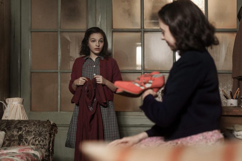 <div class="inline-image__caption"><p>Anne, played by Billie Boullet, receives a gift from Miep, played by Bel Powley, in <em>A Small Light</em>.</p></div> <div class="inline-image__credit">National Geographic for Disney/Dusan Martincek</div>