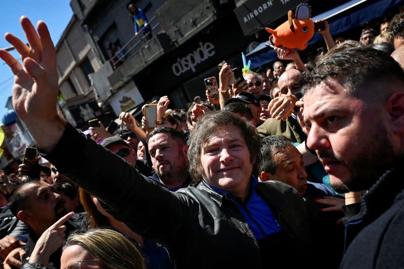 FILE PHOTO: Argentina's presidential candidate Javier Milei campaigns in Buenos Aires