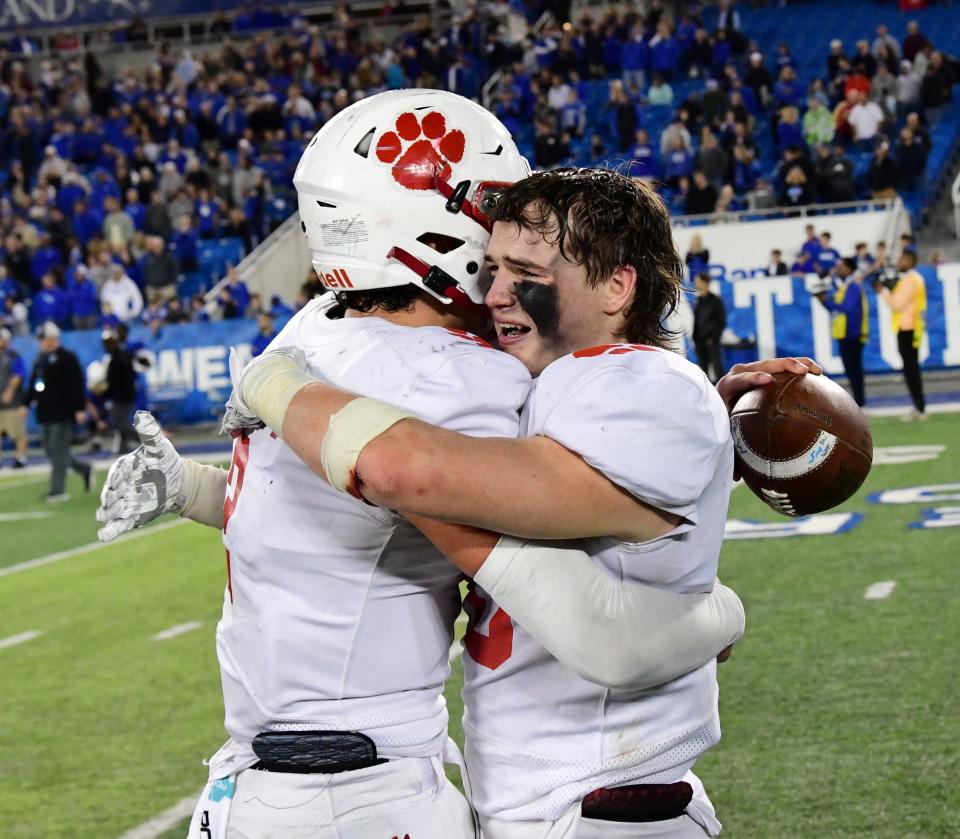 Cameron Hergott and Mitchell Berger embrace after the Beechwood Tigers win the title at the 2021 KHSAA Class 2A State Football Championship, Dec. 3, 2021.