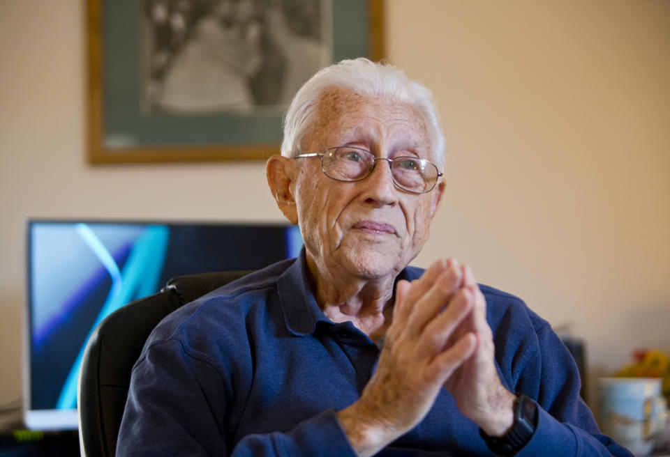 FILE - In this Feb. 6, 2016, photo, Gene Herrick listens in an interview at his home in Rocky Mount, Va. Herrick, a retired Associated Press photographer who covered the Korean War and is known for his iconic images of Martin Luther King Jr., Rosa Parks and the trial of the killers of Emmett Till in the early years of the Civil Rights Movement, died Friday, April 12, 2024. He was 97. (Stephanie Klein-Davis/The Roanoke Times via AP, file)