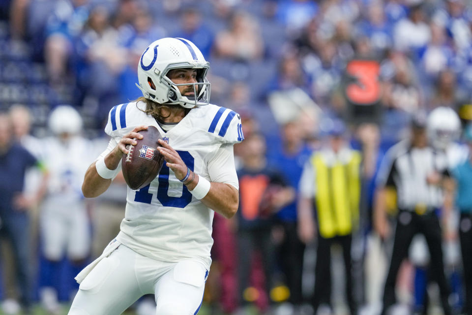 Indianapolis Colts quarterback Gardner Minshew (10) looks to throw during the first half of the team's NFL preseason football game against the Chicago Bears in Indianapolis, Saturday, Aug. 19, 2023. (AP Photo/Michael Conroy)
