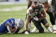 Tampa Bay Buccaneers' Scott Miller (10) recovers a fumble by Indianapolis Colts' Nyheim Hines (21) during the second half of an NFL football game, Sunday, Nov. 28, 2021, in Indianapolis. (AP Photo/AJ Mast)