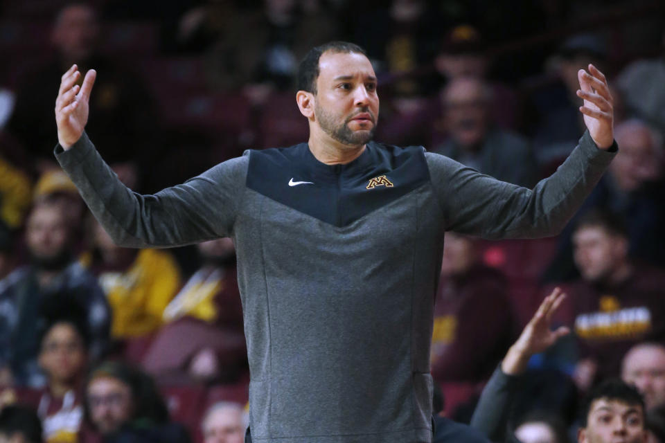 Minnesota head coach Ben Johnson questions a referee on a call during the first half of an NCAA college basketball game Thursday, March 2, 2023, in Minneapolis. Minnesota won 75-74. (AP Photo/Bruce Kluckhohn)