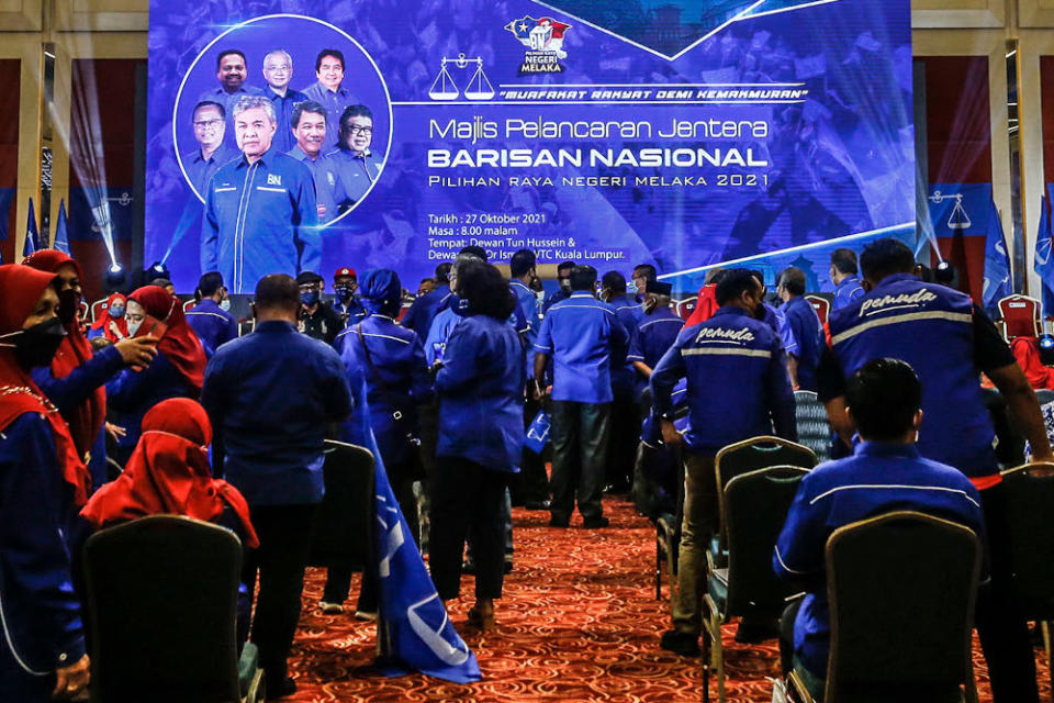 Barisan Nasional members at the launch of the coalition's election machinery for the Melaka state poll at the World Trade Centre Kuala Lumpur October 27, 2021. ― Picture by Hari Anggara