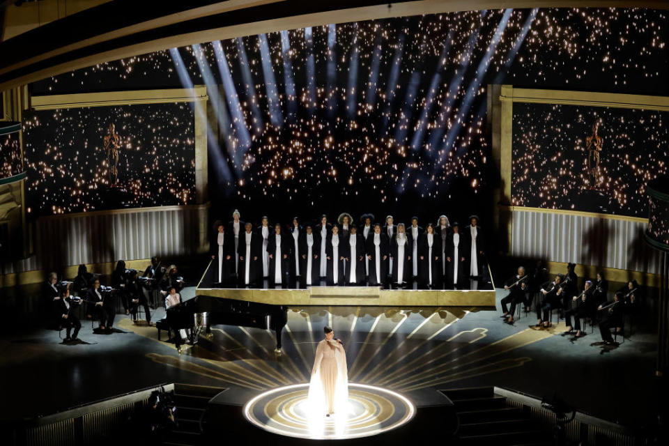 Diane Warren and Sofia Carson perform onstage