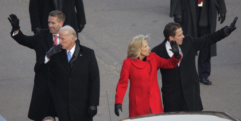 Vice President Joe Biden, his wife Jill and sons Hunter, and Beau, walk on Pennsylvania Avenue near the White House in Washington, Tuesday, Jan. 20, 2009, during his inaugural parade. 