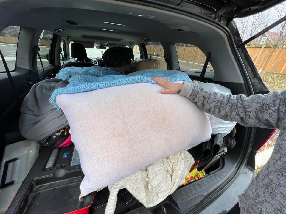 The woman now sleeps in the back of her vehicle with a wool blanket and pillow. She says living in her car is becoming more difficult as the days grow shorter and the nights colder. 