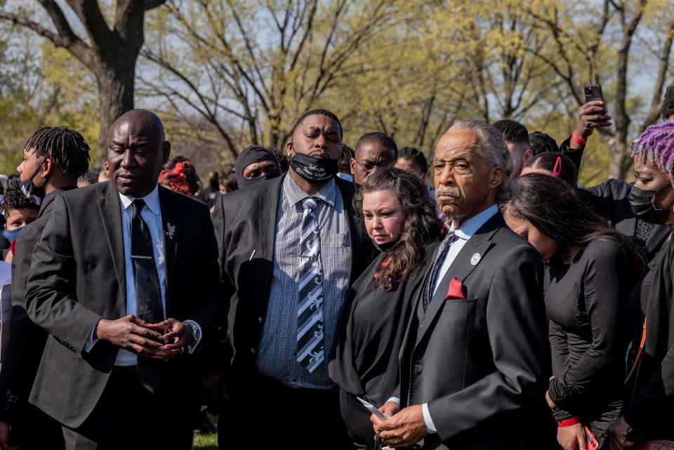 Aubrey and Katie Wright, the parents of Daunte Wright, stand with Crump (far left) and Sharpton (far right), at Lakewood Cemetery after their son's funeral in Minneapolis on April 22.<span class="copyright">Ruddy Roye for TIME</span>