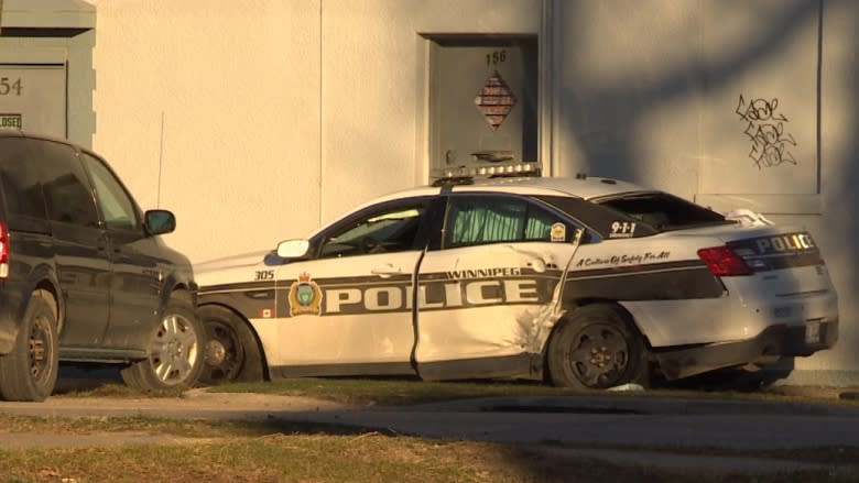 Police car slammed into at Winnipeg intersection, officers sent to hospital