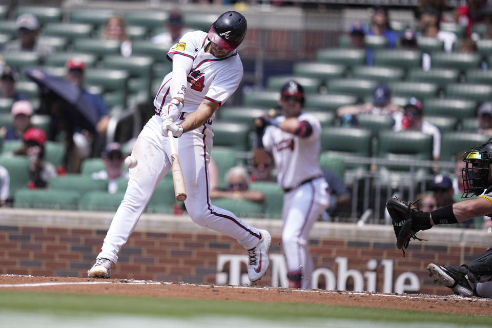 Atlanta Braves' Matt Olson (28) hits a single in the first inning of a baseball game against the Pittsburgh Pirates, Sunday, June 30, 2024, in Atlanta. (AP Photo/Brynn Anderson)