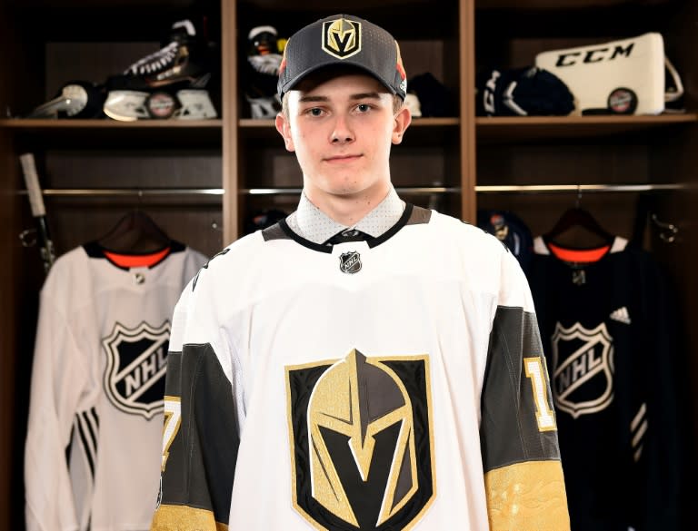 Cody Glass poses for a photo after being selected sixth overall by the Vegas Golden Knights during the 2017 NHL Draft, at the United Center in Chicago, Illinois, on June 23