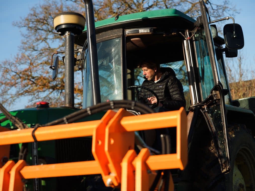 Andy Cato on a tractor (A Story About Bread – Wildfarmed)