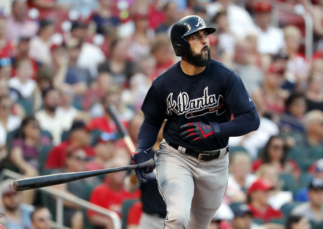 ATLANTA, GA - AUGUST 19: Atlanta Braves All-Star right fielder Nick Markakis  (22) stands on third base during the MLB game between the Atlanta Braves  and the Colorado Rockies on August 19