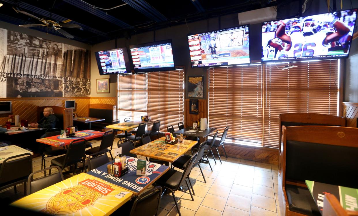 The 20 TVs at Taphouse on the Edge near the University of Notre Dame are one of the ingredients that make it a popular spot to watch sporting events.