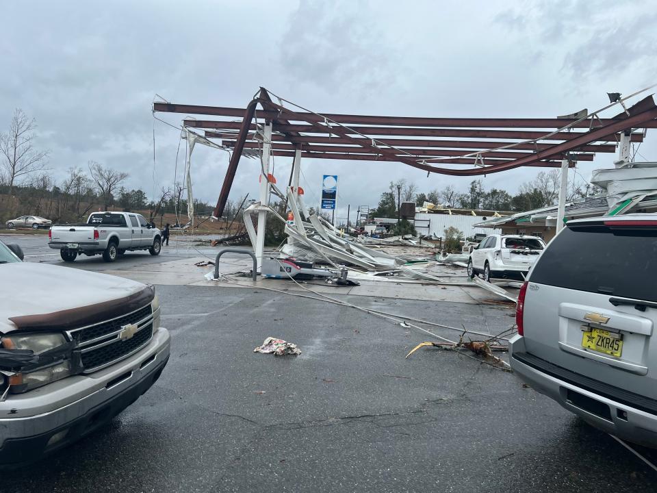 A damaged gas station and debris pictured in Jackson County, Florida on 9 January following a tornado (Courtesy of Ramsey Romero)