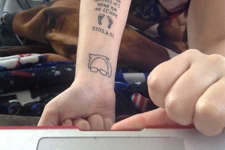 Haley Lent, 22, a photographer from Cedar Rapids, Iowa displays a Bernie Sanders tattoo in this undated handout photo. REUTERS/Haley Lent/HANDOUT