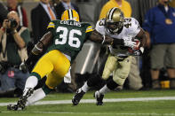 GREEN BAY, WI - SEPTEMBER 08: Darren Sproles #43 of the New Orleans Saints returns a punt against M.D. Jennings #43 of the Green Bay Packers during the season opening game at Lambeau Field on September 8, 2011 in Green Bay, Wisconsin. (Photo by Jonathan Daniel/Getty Images)