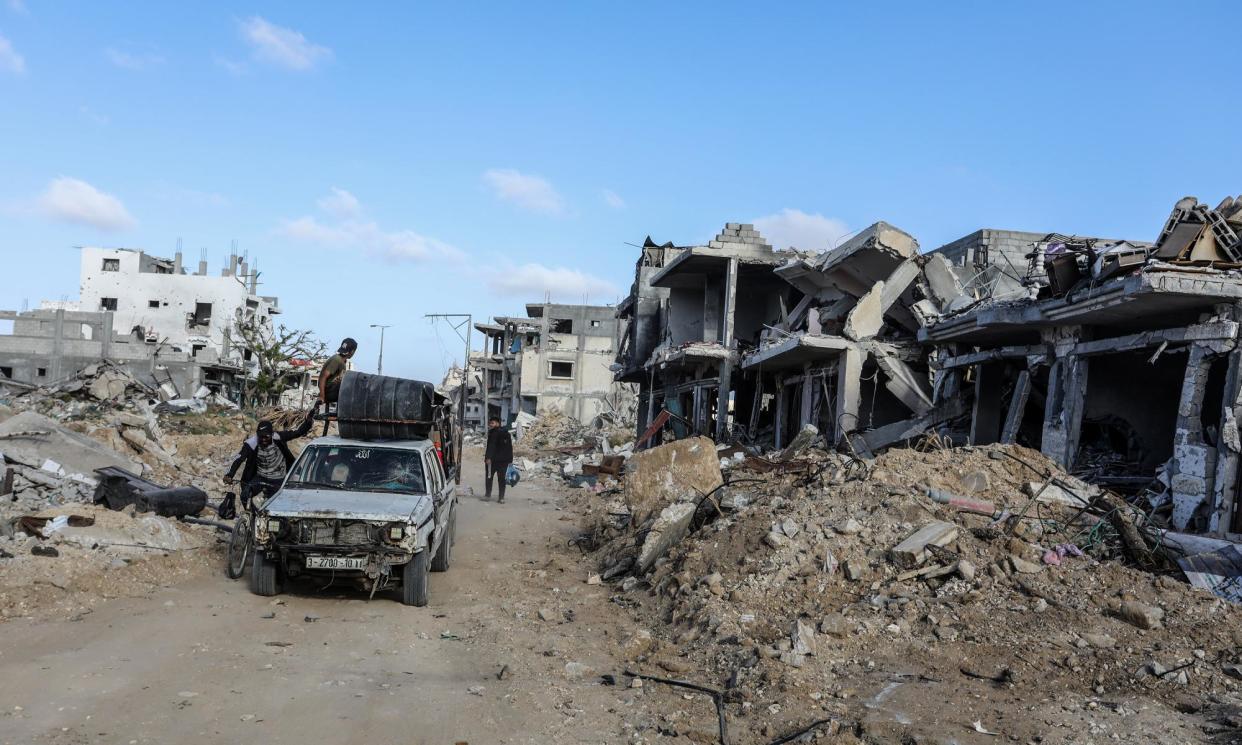 <span>Damaged buildings in Khan Younis in Gaza on Friday.</span><span>Photograph: Anadolu/Getty Images</span>