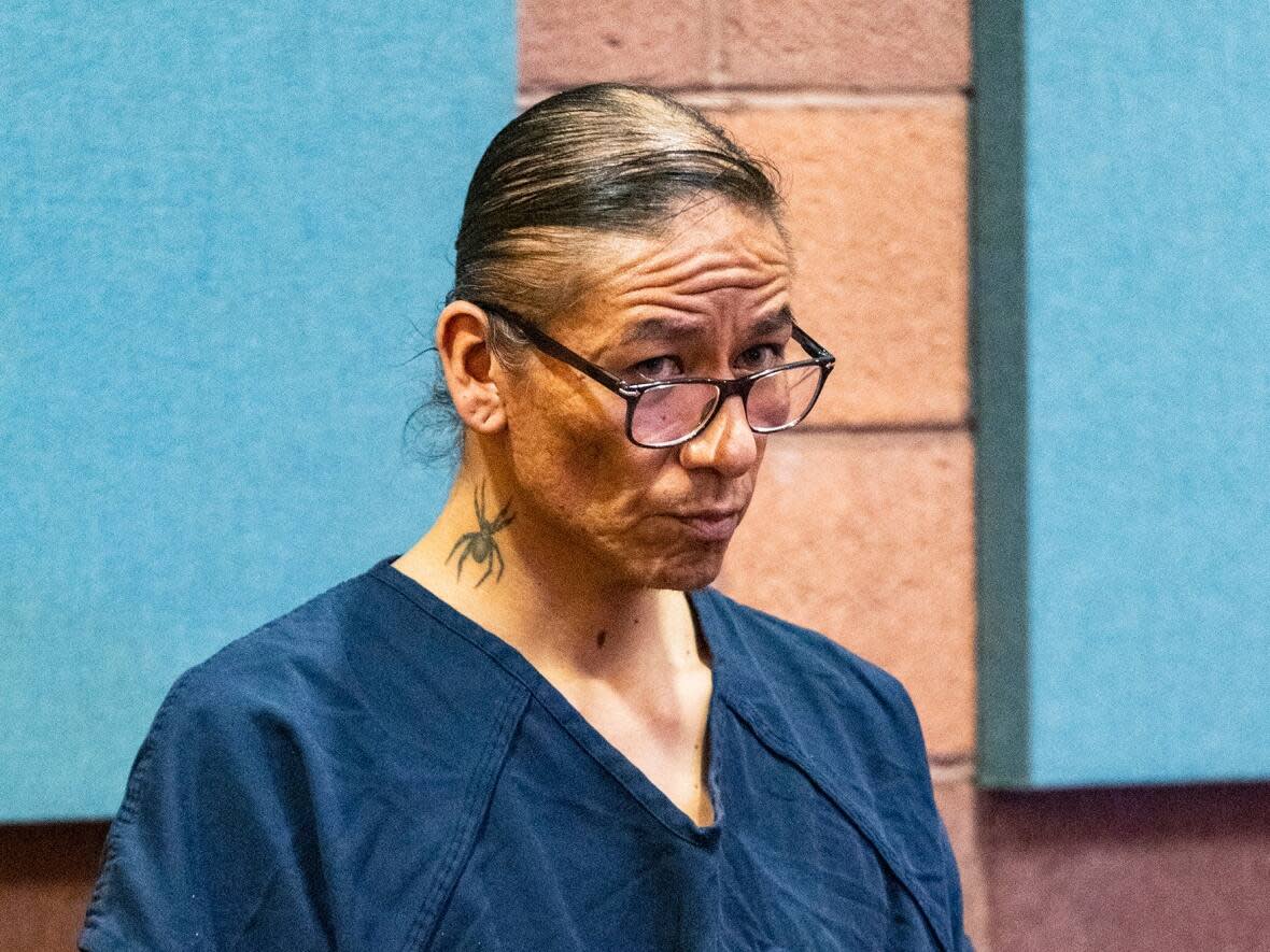 Former actor Nathan Lee Chasing His Horse, center, also known as Nathan Chasing Horse, appears in court during his bail hearing at North Las Vegas Justice Court on Feb. 8, 2023. (Bizuayehu Tesfaye/Las Vegas Review-Journal via The Associated Press - image credit)