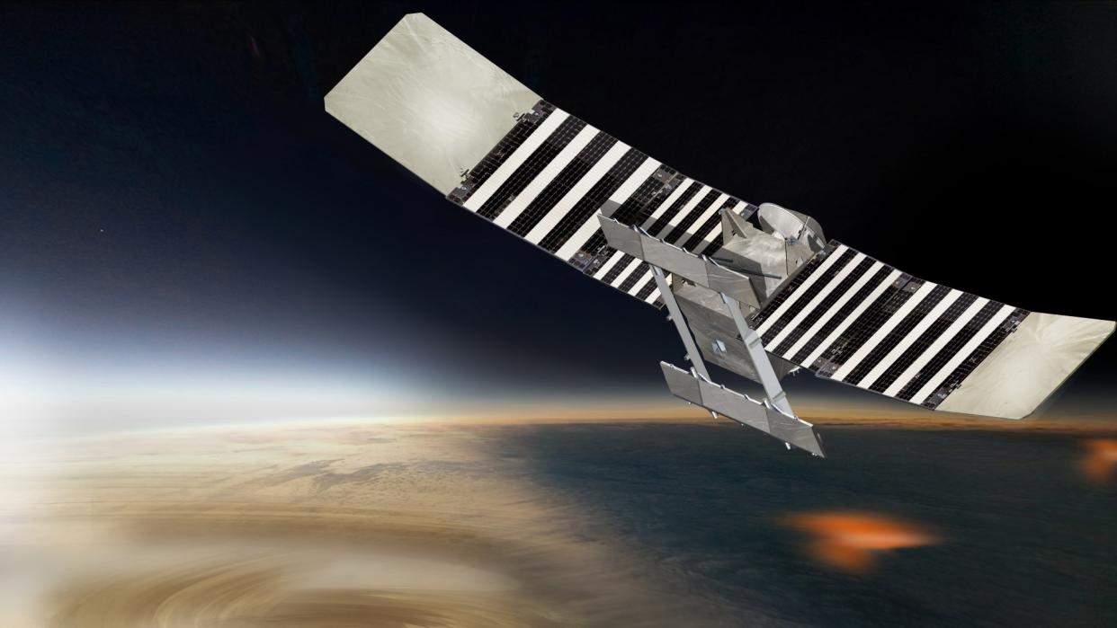  an illustration of a spacecraft in orbit above venus with its solar panel arrays extended 