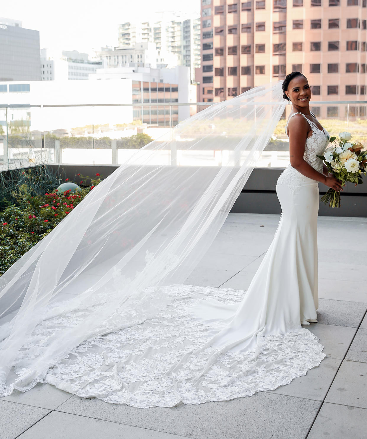 Ashleigh in one of her two custom Justin Alexander dresses. (Felisha Carrasco and Christian Galvan)