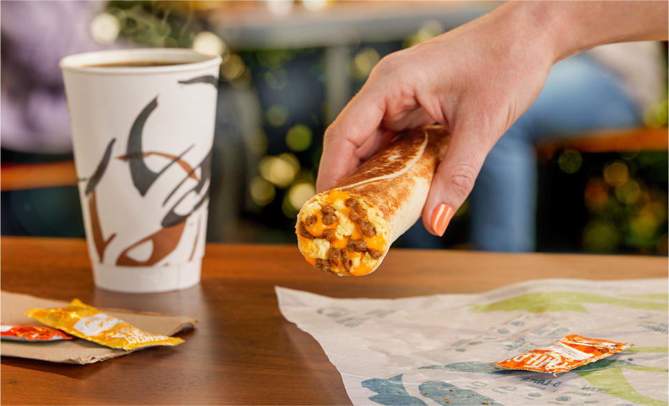 Hand holding a burrito (BENJAMIN MORRIS / Courtesy Taco Bell)