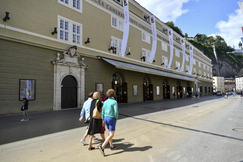 Out side view of the opera house in Salzburg, Austria, Wednesday, Aug. 14, 2019 where singer Placido Domingo will perfom 'Luisa Miller' by Giuseppe Verdi. Numerous women have told The Associated Press that celebrated opera superstar Placido Domingo tried to pressure them into sexual relationships by dangling jobs and sometimes punishing them when they refused his advances. (AP Photo/Kerstin Joensson)