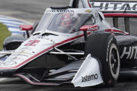 FILE - In this June 12, 2021, file photo, Josef Newgarden drives during the first race of the IndyCar Detroit Grand Prix auto racing doubleheader on Belle Isle in Detroit. Newgarden won the pole position Saturday, June 19, for Sunday’s IndyCar race at Road America in Elkhart Lake, Wis. (AP Photo/Paul Sancya, File)