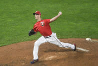 FILE - Minnesota Twins pitcher Taylor Rogers throws against the Cleveland Indians during the ninth inning of a game in Minneapolis, in this Friday, Sept. 11, 2020, file photo. The Minnesota Twins signed Alex Colomé away from their chief divisional competition, the Chicago White Sox, to bring in a proven closer to the back of the bullpen. The Twins won't formally assign that role, though, with Taylor Rogers, Hansel Robles and Tyler Duffey all in position for ninth-inning outs. (AP Photo/Craig Lassig, File)