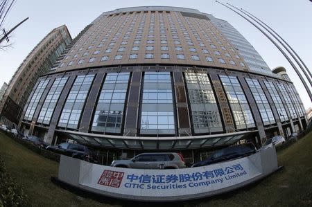 The signboard of CITIC Securities is seen at its head office in Beijing March 27, 2013. REUTERS/Kim Kyung-Hoon