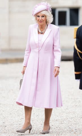 <p>Samir Hussein/WireImage</p> Queen Camilla arrives at the Elysée Palace on Sept. 20, 2023.