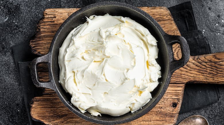 Top-down view of a bowl of whipped ricotta cheese