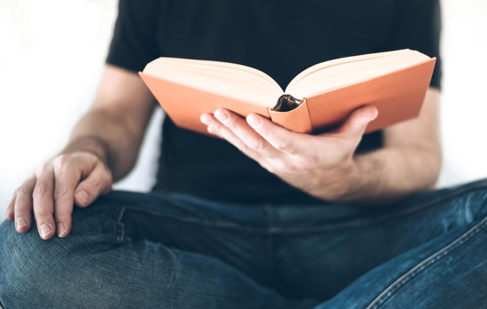 Reading can help relieve anxiety during periods of self-isolation. (Image via Getty Images). 